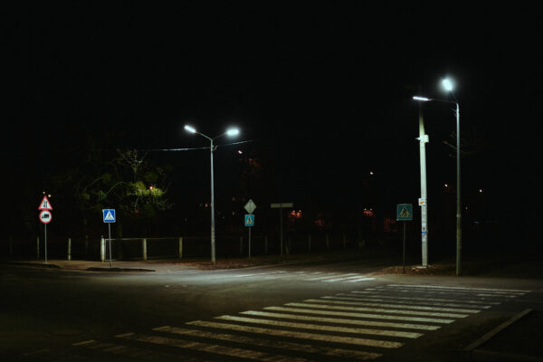 Pedestrian,Crossing,At,Night,In,The,Illumination,Of,Street,Lamps