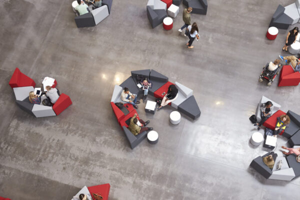 Students,Groups,Sitting,In,A,Modern,University,Atrium