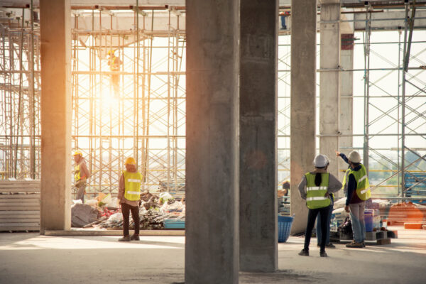 Group,Of,Construction,Engineer,Team,In,Standard,Safety,Uniform,Work